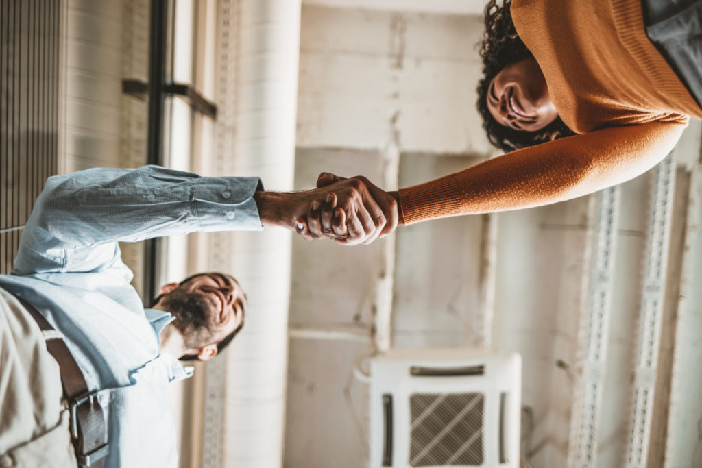 Two people shaking hands